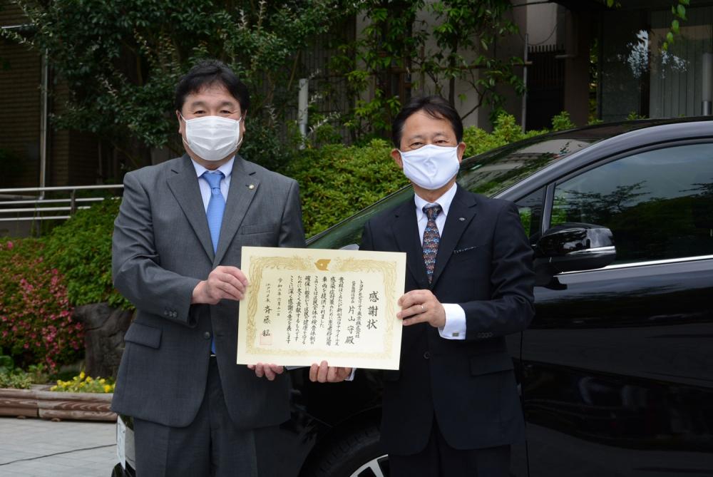 写真：車両提供の様子