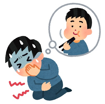 食中毒で苦しむ人の画像