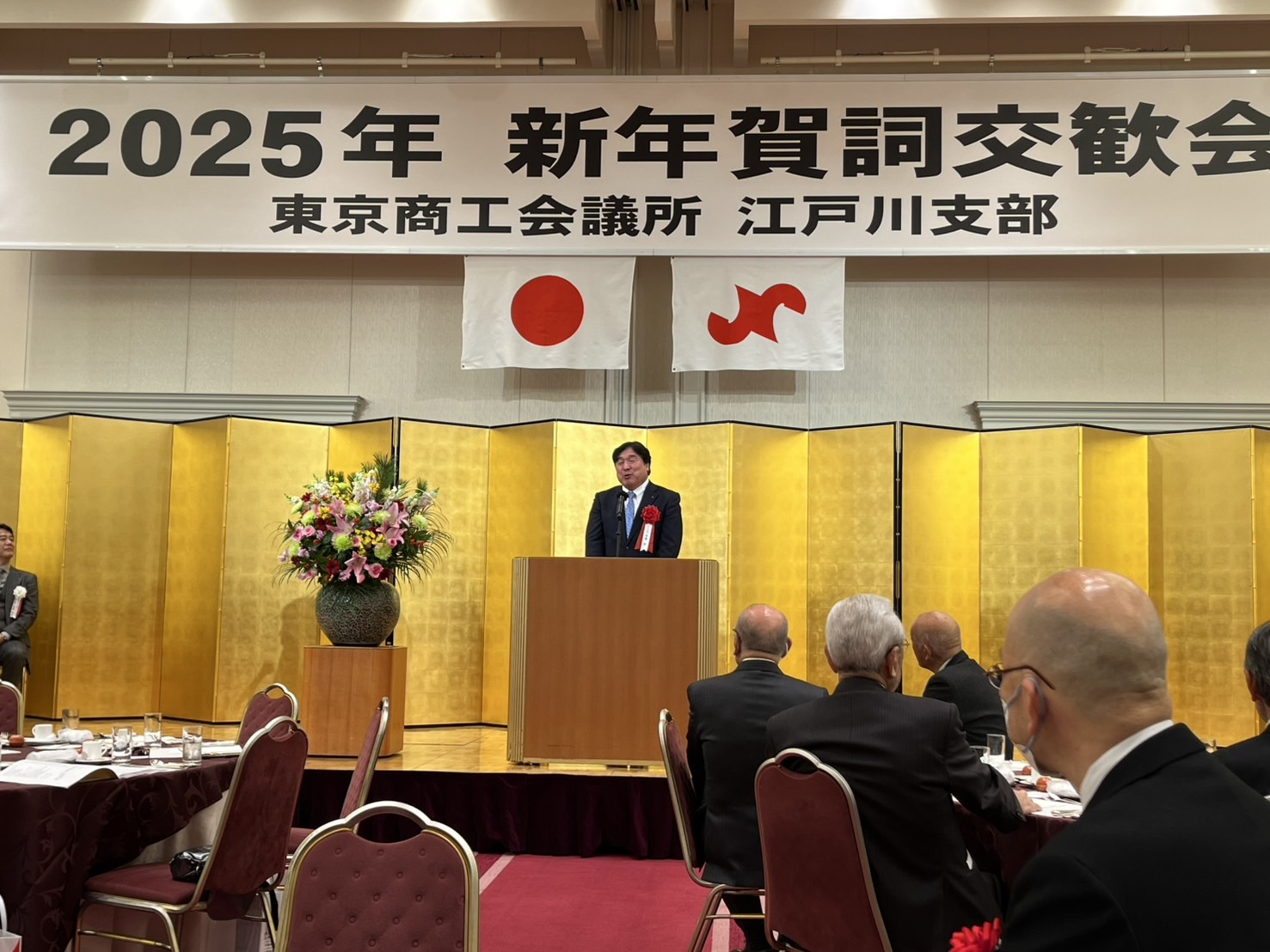 上記の会で挨拶する区長